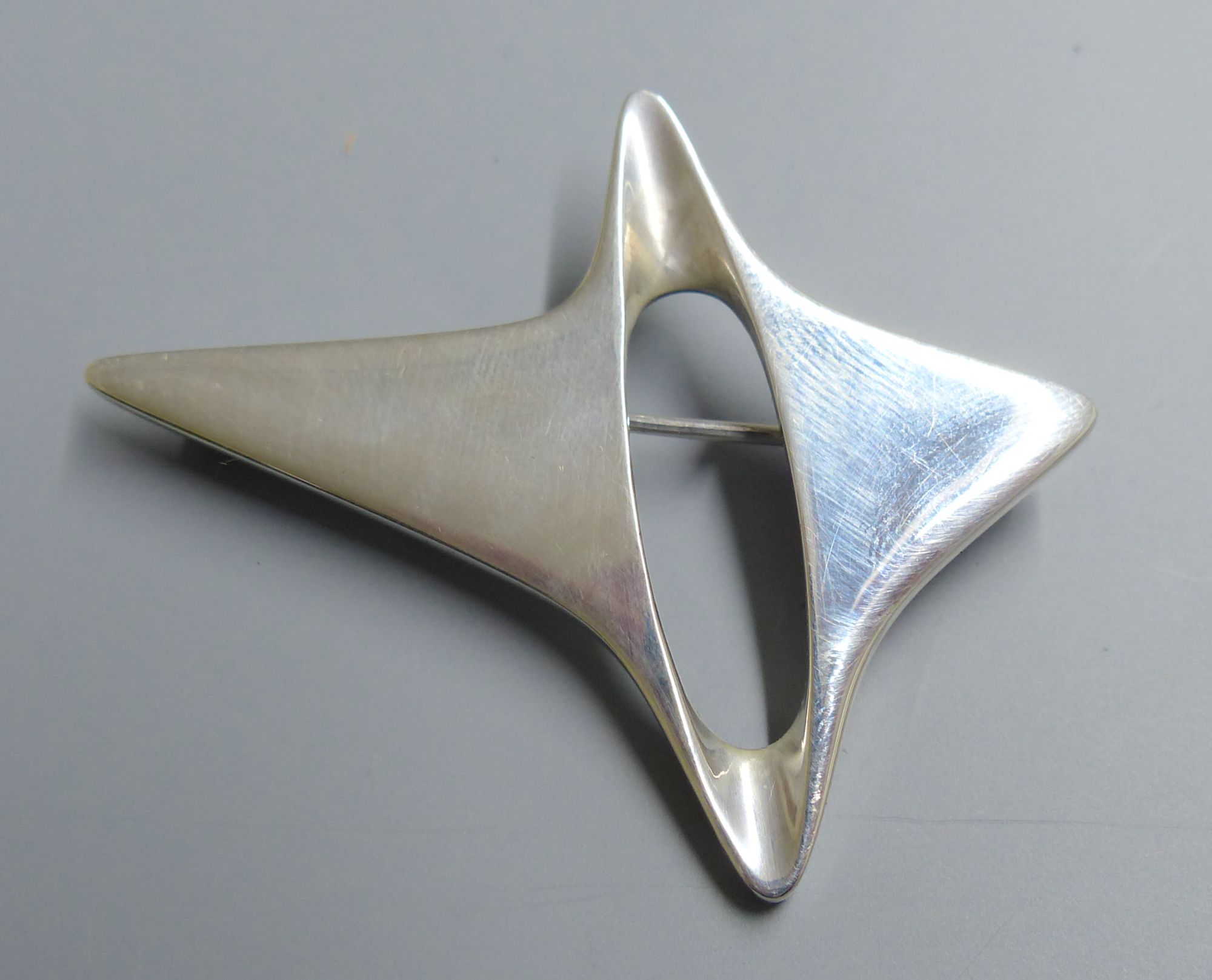 A Georg Jensen sterling abstract brooch, designed by Henning Koppel, no. 339, 57mm.